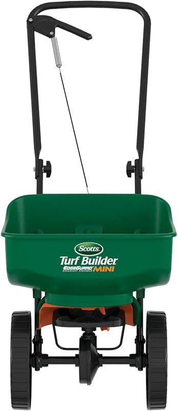 Top 6 Fertilizer Spreaders for Riding Lawn Mowers green Scotts Turf Builder broadcast spreader with black wheels